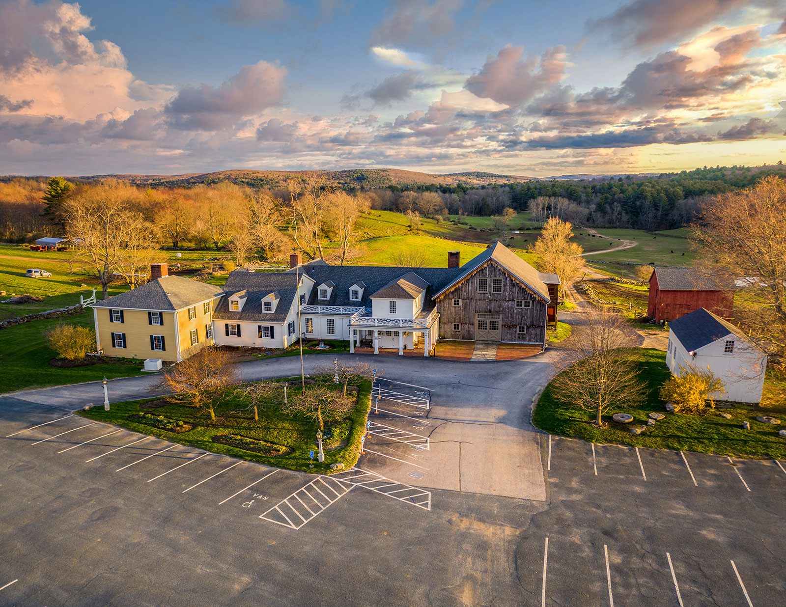 A high-angled shot of the Salem Cross Inn property, including outbuildings and parking lot.